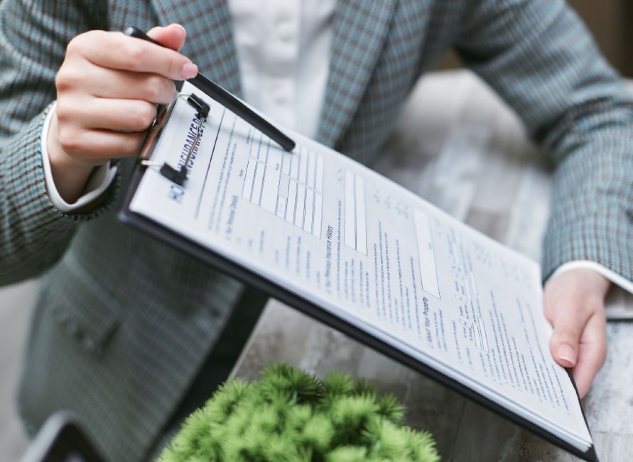 Insurance claim form clipboard